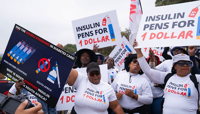 A group of people protesting insulin prices